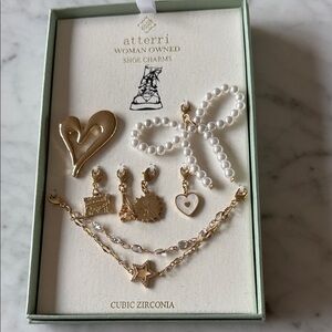 Atterri shoe charms. New in box. Great gift. 7 charms.